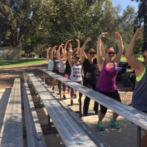 Moms at Fit4mom class with their kids in strollers