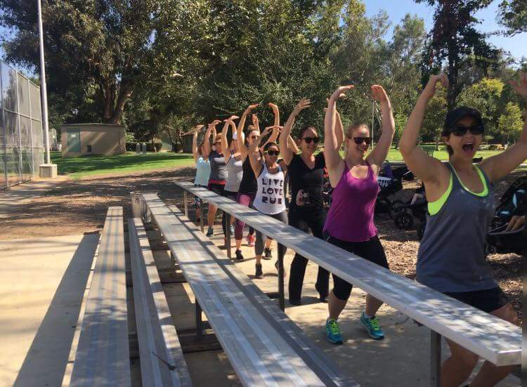 Moms at Fit4mom class with their kids in strollers