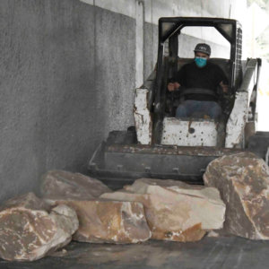 Boulders placed in LA neighborhood’s freeway corridor fuel feud over plight of homeless