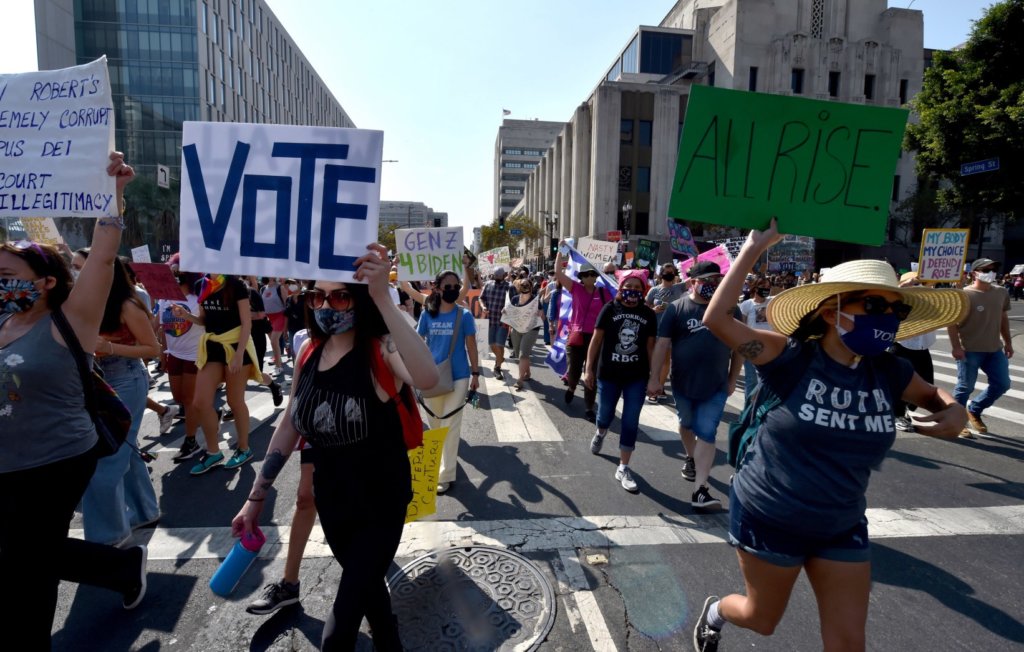 Women protest against Trump/Pence, rally voters around Southern California