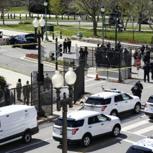 Car rams Capitol barricade, injuring 2 officers; driver shot