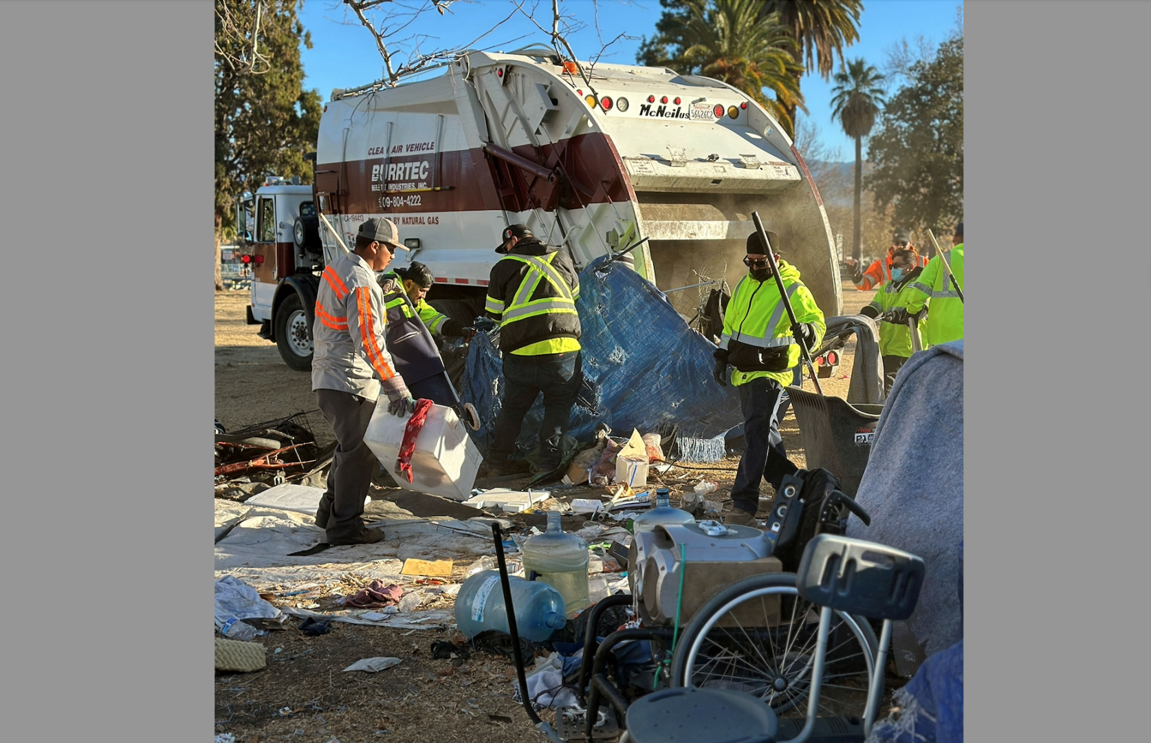 A municipal crew clears an encampment from Meadowbrook Park.